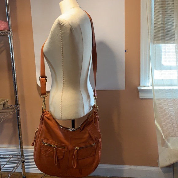 Linea Pelle Cross body added dressed coin purse. - Picture 10 of 11